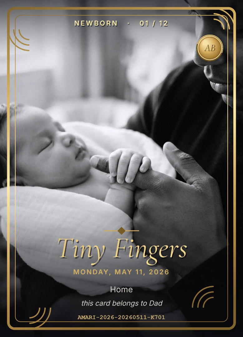 The same tiny hand in black and white on a full-bleed keepsake card